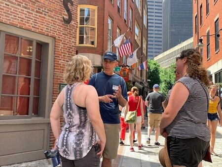 Charlie leading a tour in Boston