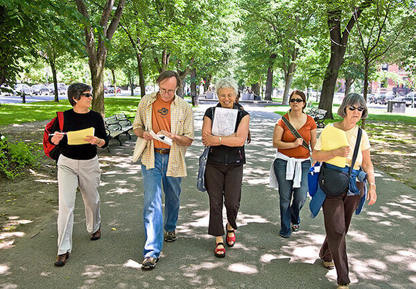 tour guides walking on Commonwealth avenue gardens