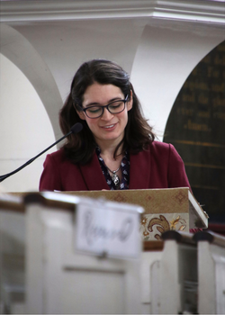 Samantha Nelson at podium